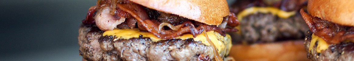 Eating Burger Fast Food Greek at Hercules Burgers restaurant in Lynwood, CA.